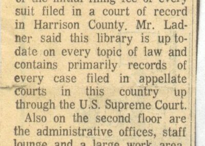 A newspaper clipping containing a long column of text titled “New Library,” describing study areas, a law library collection, administrative offices, and the architectural design philosophy behind the new Gulfport–Harrison County Library.