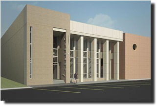 Gulfport Public Library with a tall glass entrance framed by vertical white columns, attached to a beige and brick structure, with a paved parking area in front.